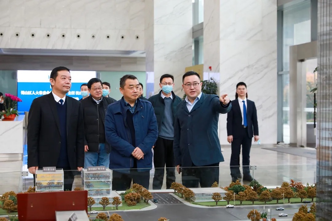 合肥市蜀山區人大常委會主任沈成富一行深入新華控股集團和華地集團調研指導！